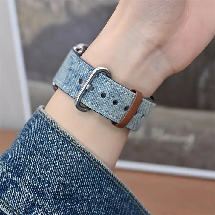 Stylish women's smartwatch band made of soft denim, perfect for casual outfits.