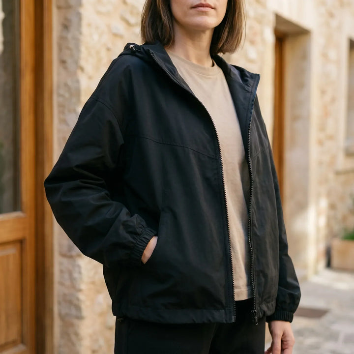 Women's casual hooded windbreaker jacket. Lightweight, perfect for spring, fall, and transitional weather. Everyday fashion outerwear.