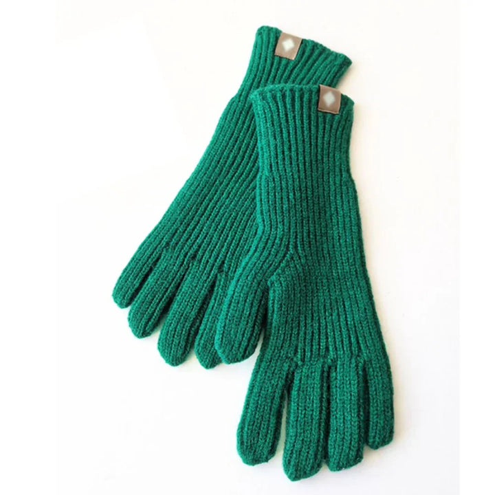 Warm knitted women's gloves with touchscreen compatibility, ideal for cold weather.