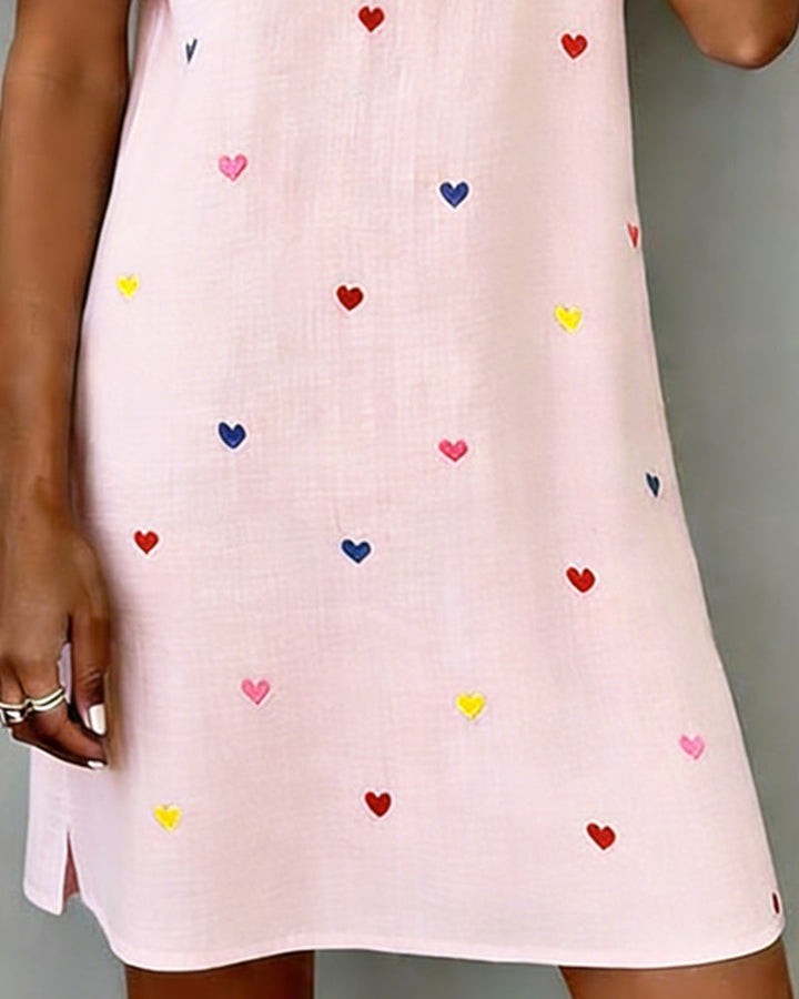 Light & breezy women's summer mini dress with playful heart print, puff sleeves, V-neck. Relaxed everyday casual fit.