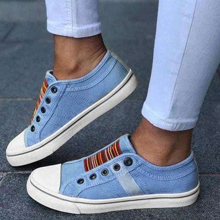 Stylish women's lace-up sneakers, ideal for sporty chic everyday fashion & comfortable walking.