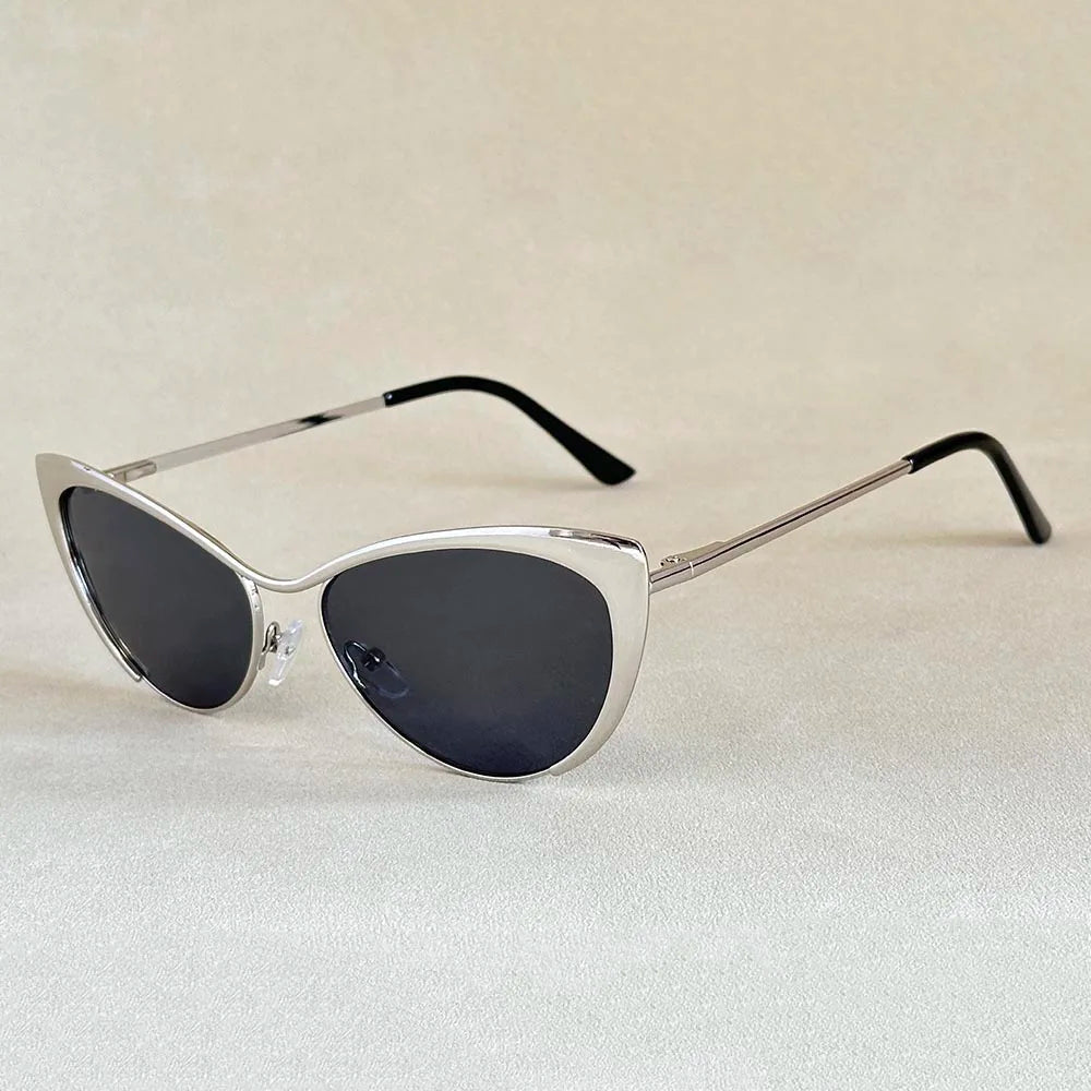 Luxury women's cat eye sunglasses. Stylish UV400 protective eyewear, a chic fashion accessory.