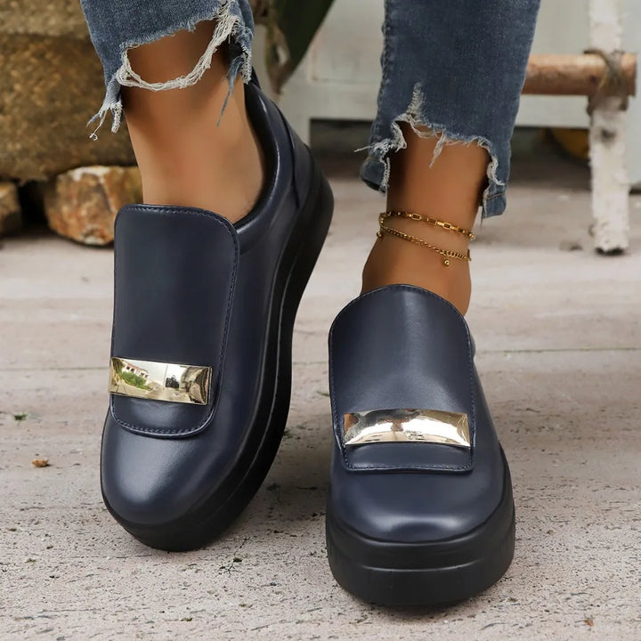 Modern & stylish Celina Rise women's platform sneakers, gold trim, comfort sole.