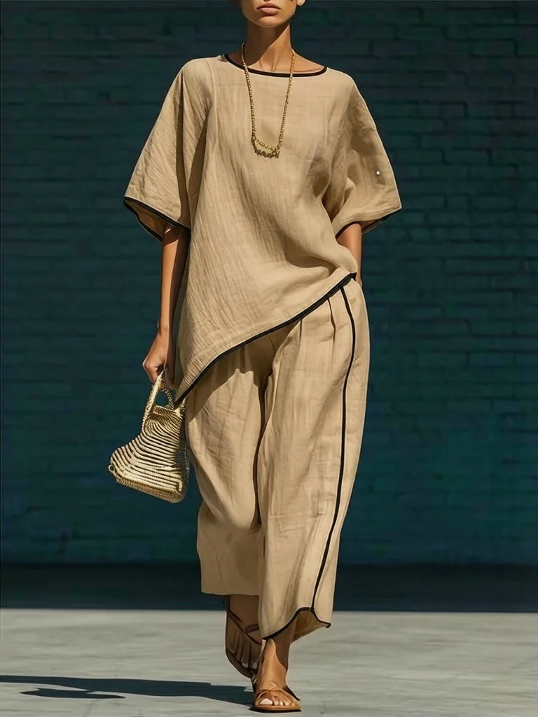 Effortless women's 2-piece set: relaxed top & wide-leg cropped pants. Ideal for versatile casual fashion.