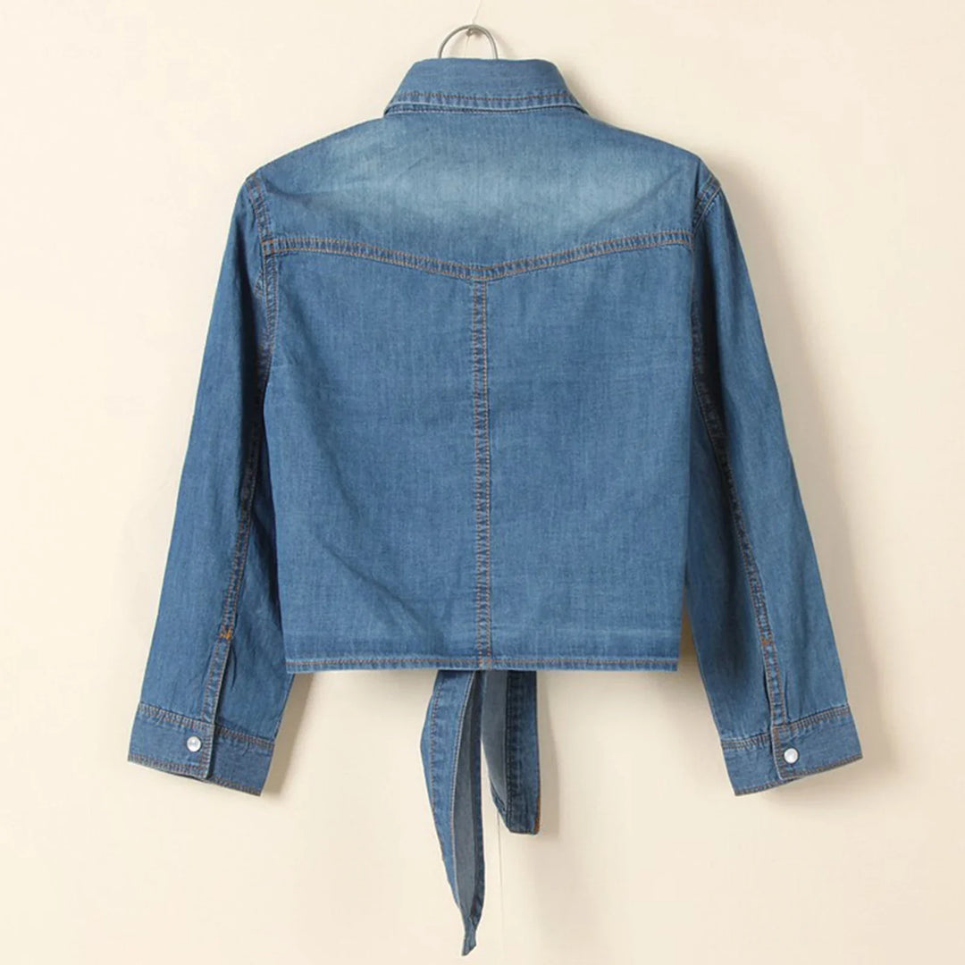 Versatile women's blue tie-front shirt, relaxed fit, button-up for day to night effortless style.