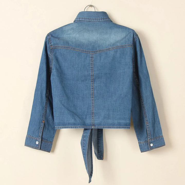 Versatile women's blue tie-front shirt, relaxed fit, button-up for day to night effortless style.