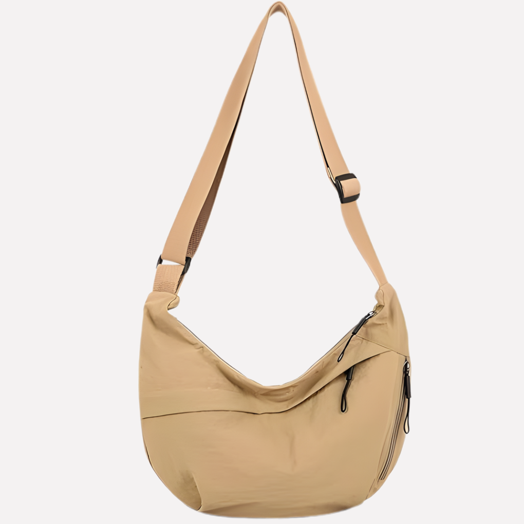 Complete look of a women's crescent shoulder bag, featuring its trendy braided strap and versatile appeal as a handbag.