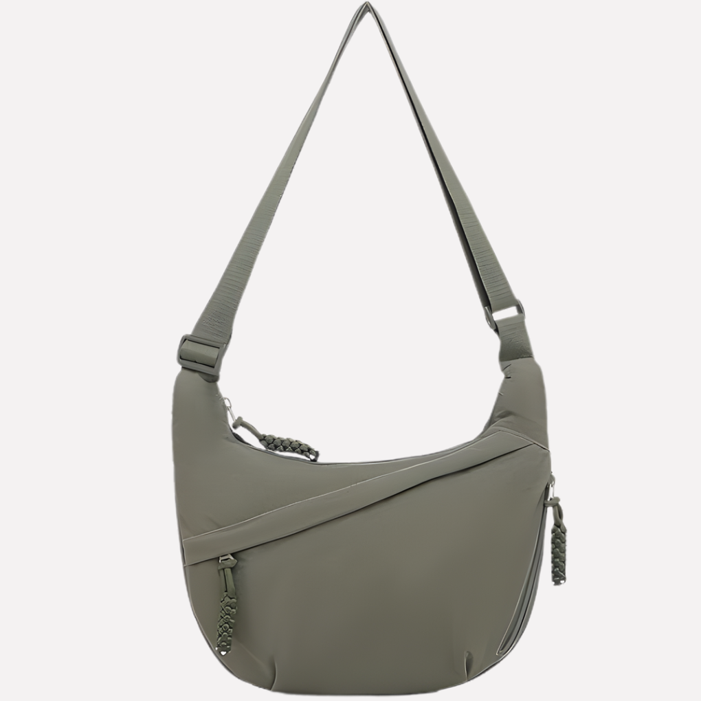 Stylish women's crescent shoulder bag in a versatile color, perfect for an everyday accessory. Features chic braided detail.