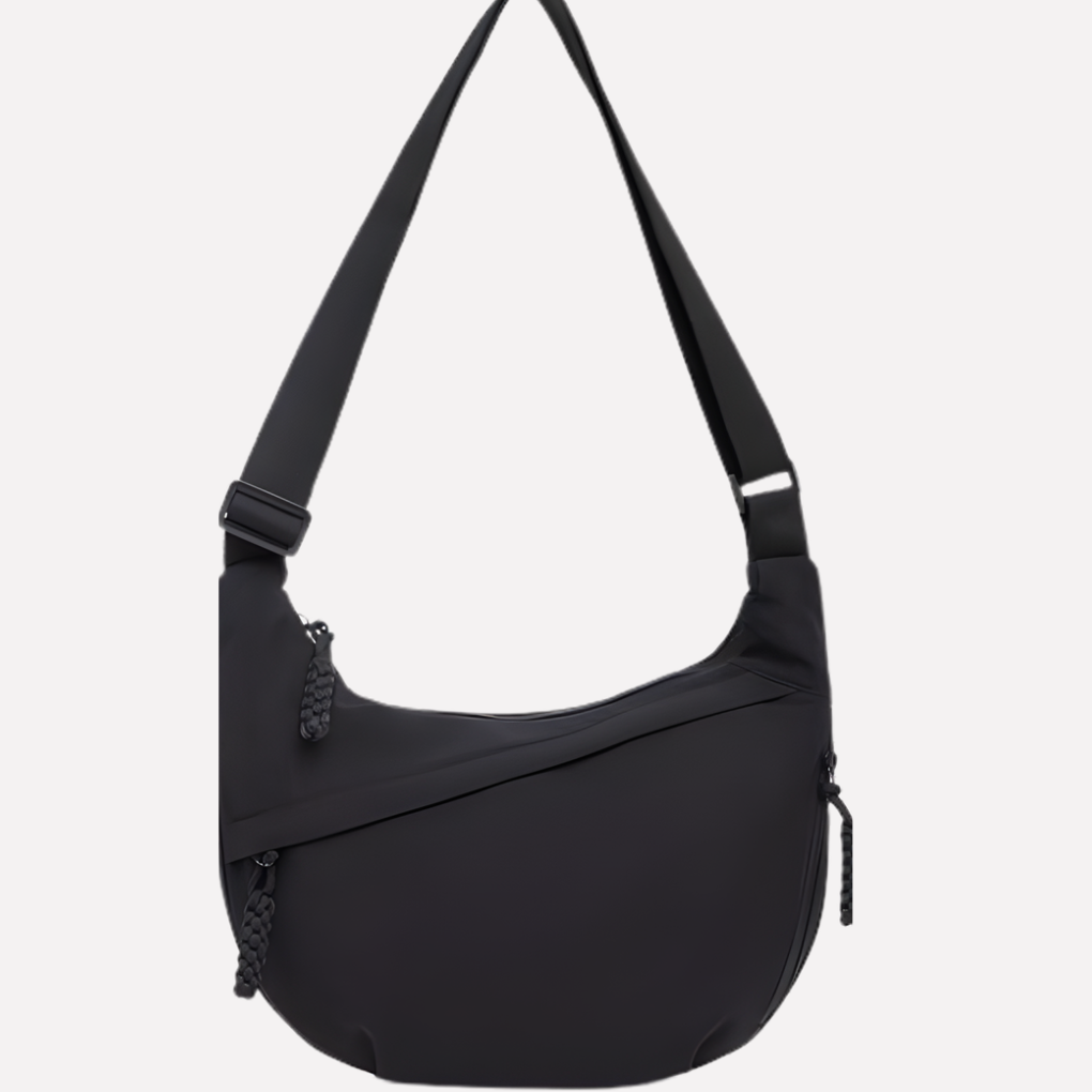 Women's versatile crescent shoulder bag with braided detailing, ideal for daily use. A chic and practical handbag.