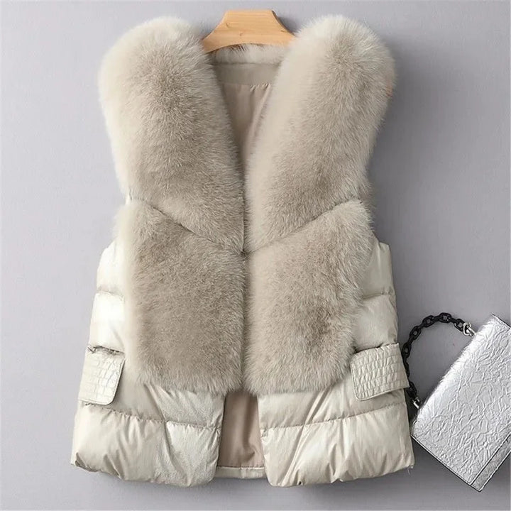 Elegant women's faux fur quilted vest, a versatile sleeveless jacket for chic winter outfits and layering.