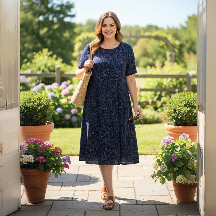 Women's chic floral midi summer dress, perfect for sunny days & vacation. Flowy and comfortable.