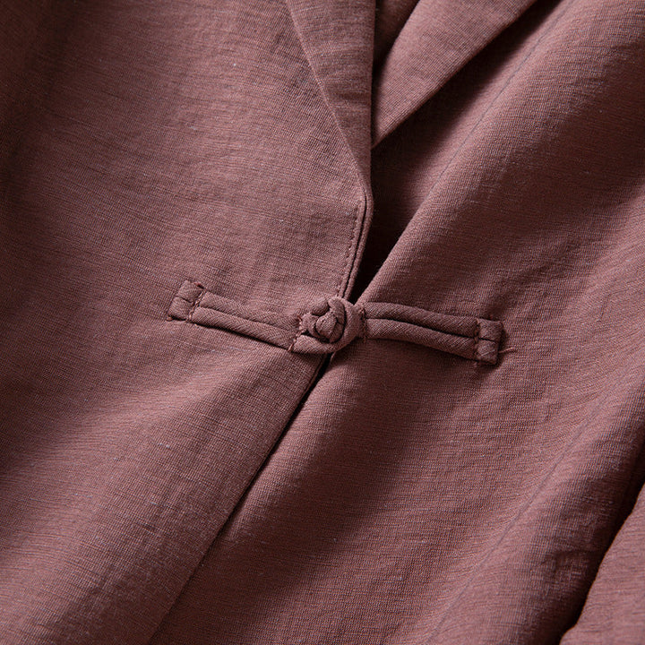 Modern women's knot-front blazer, a stylish jacket and elegant layering piece for a chic contemporary look.