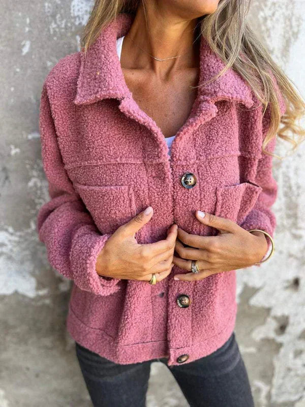 Elegant women's lapel collar jacket, stylish short design, versatile for autumn fashion.
