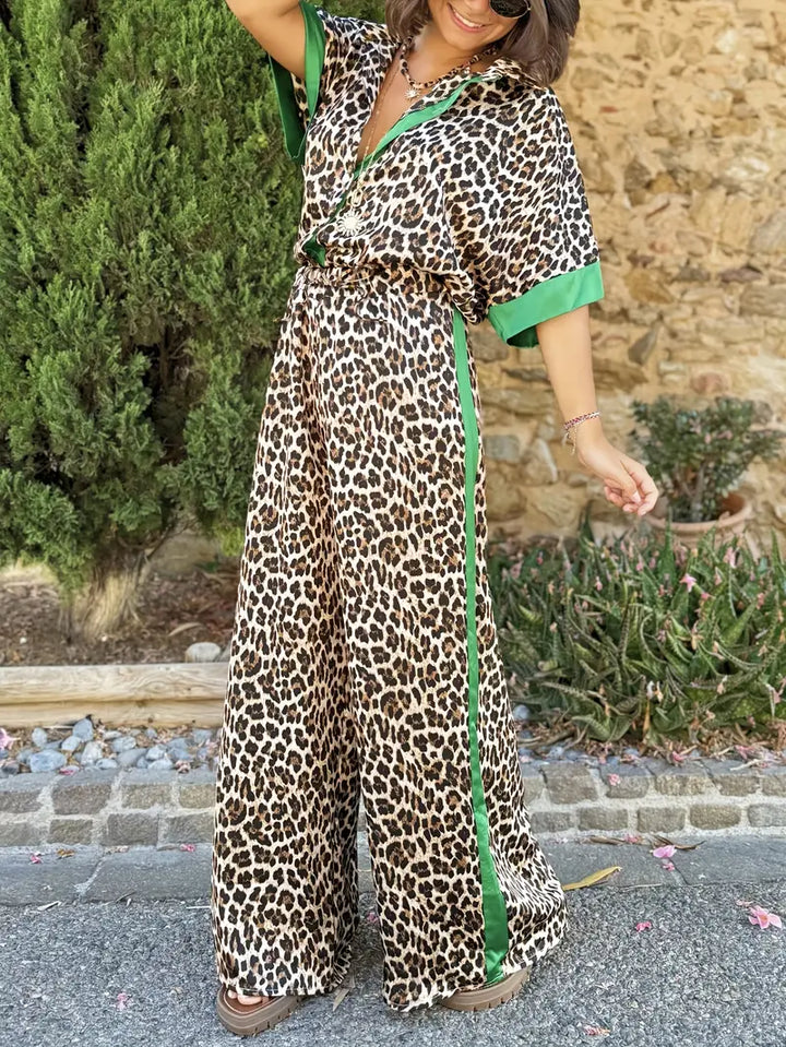 Fashionable women's leopard print jumpsuit. Features a flattering V-neck, wide leg, and relaxed comfortable fit.