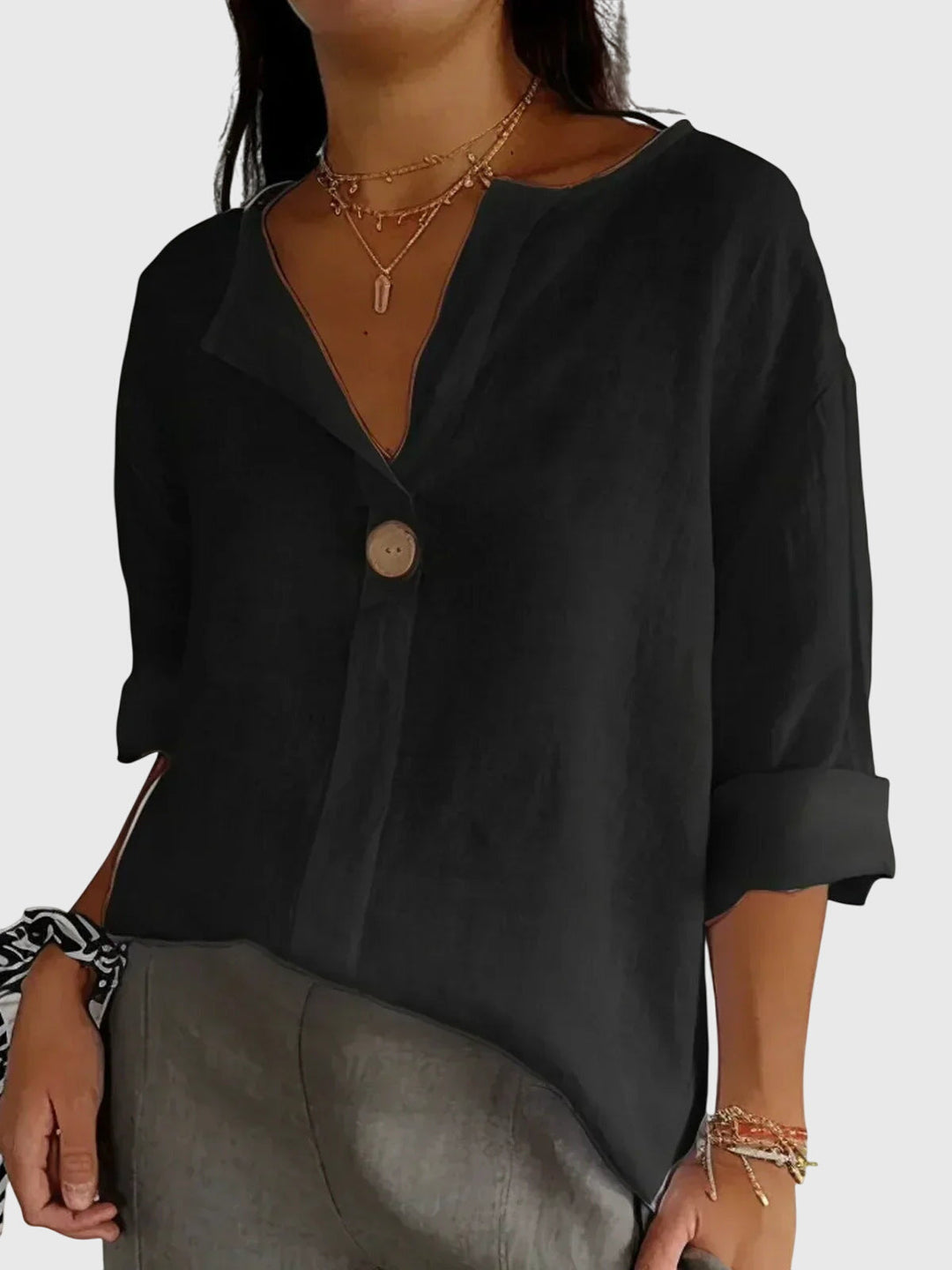 Elegant long sleeve women's blouse, a chic top for versatile everyday fashion.