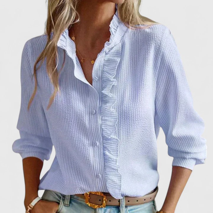 Versatile women's long sleeve blouse, relaxed fit, elegant everyday top, suitable for professional and casual looks.