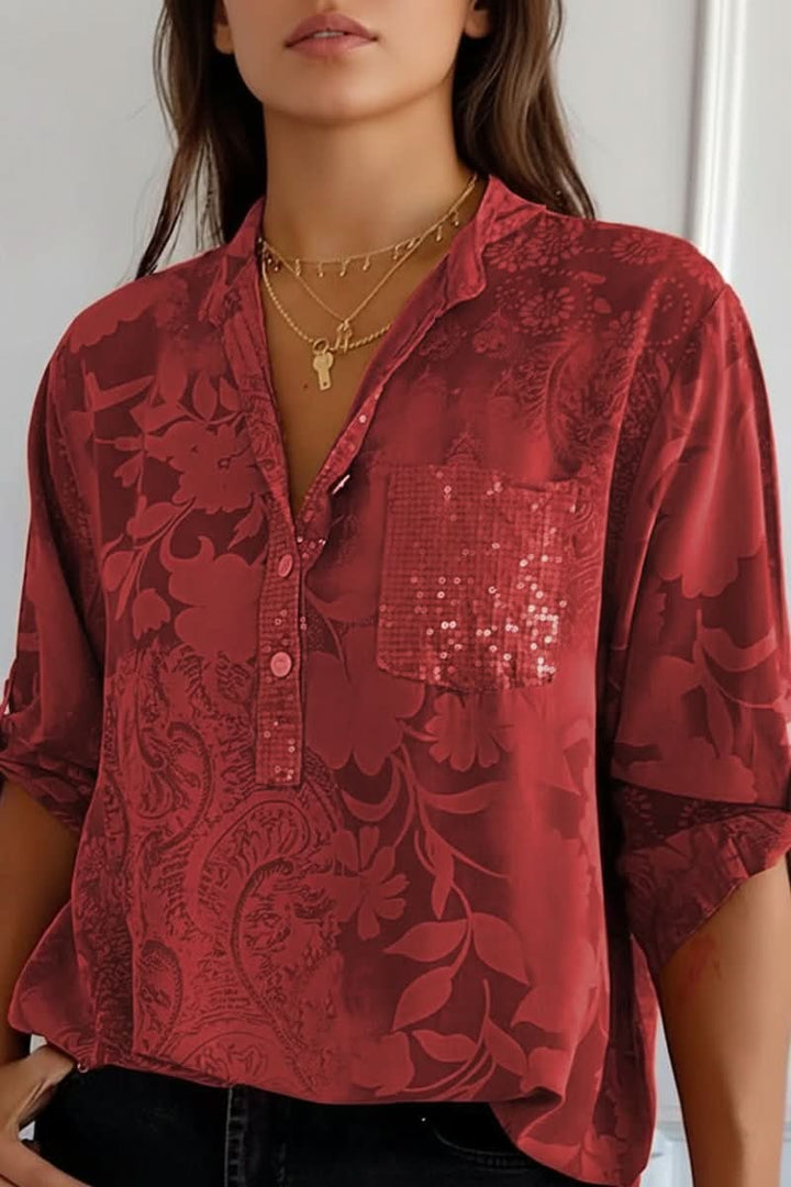 Fashionable women's printed blouse. Long-sleeve workwear shirt with front pocket, offering versatile summer style.