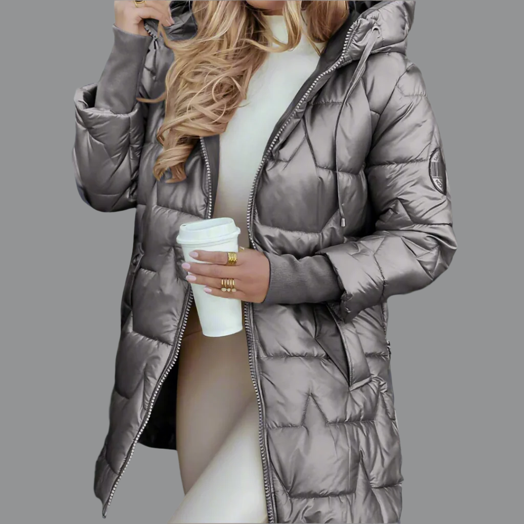 Comfortable women's quilted autumn jacket. Features a stylish design, lightweight warmth for fall.