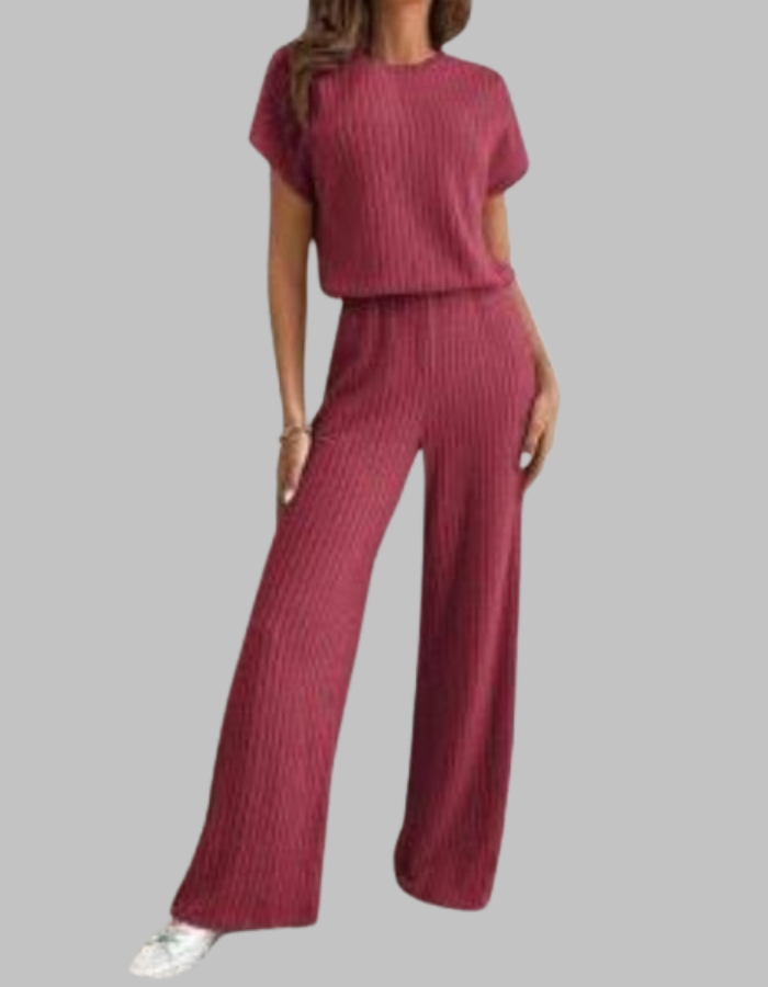 Modern women's short sleeve top and wide leg pants set, a fashionable choice for spring and summer.