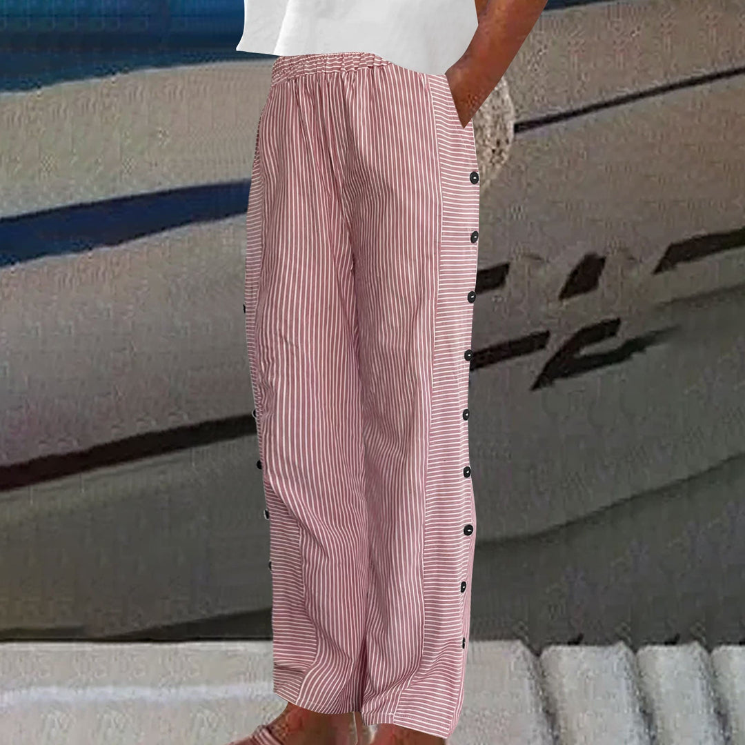 Fashionable women's striped pants with stylish button accents, offering a comfortable and chic everyday look.