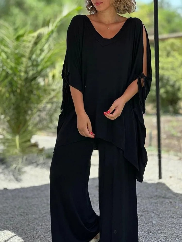 Effortless women's casual chic two-piece outfit, featuring wide-leg pants, ideal for versatile summer styling.