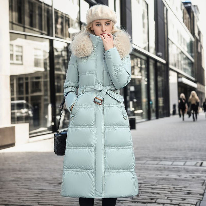 Stylish women's thermal winter coat, designed with a tailored fit and sophisticated removable hood.