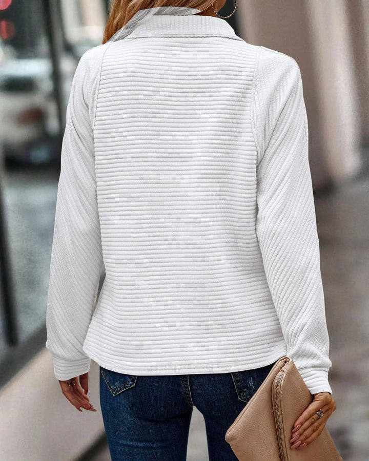 Effortless style: Women's zippered V-neck sweater, perfect for elegant casual or office wear.