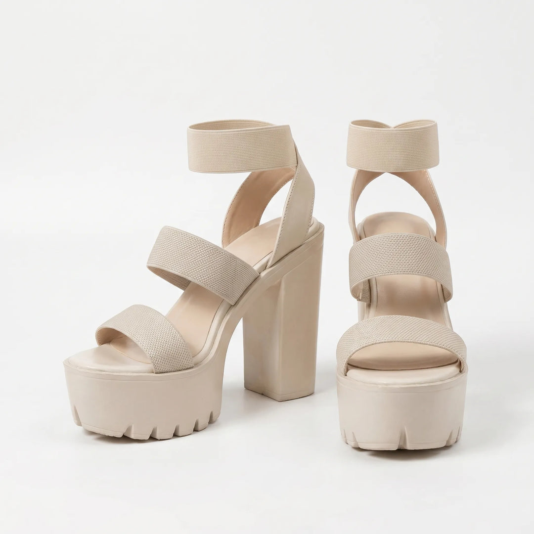 Trendy women's slip-on chunky platform sandals with block heel for comfortable everyday summer wear.