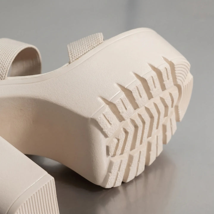 Fashionable open-toe women's chunky platform sandals with a sturdy block heel for versatile styling.