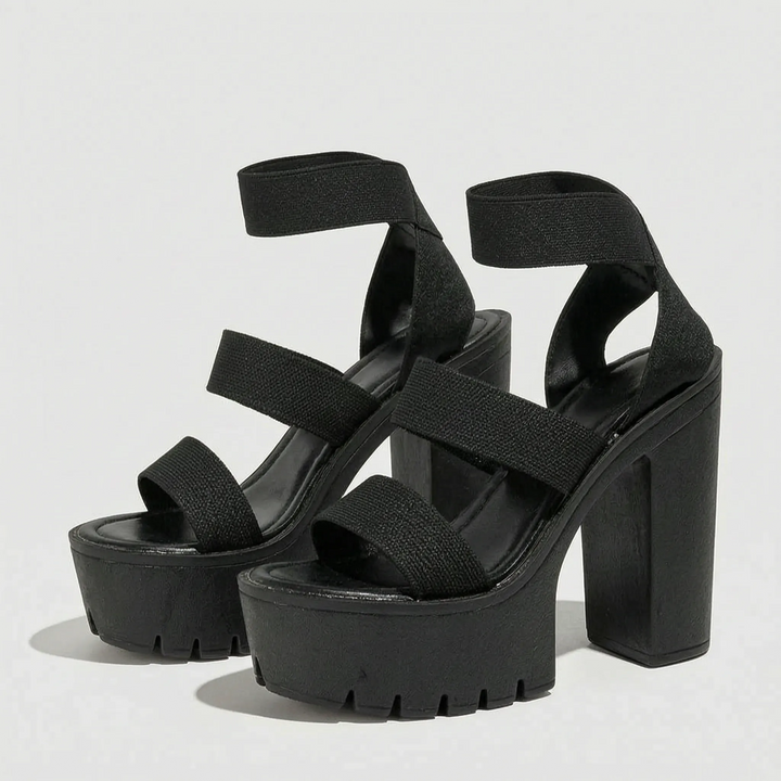 Stylish women's chunky platform sandals with an open-toe design and stable block heel for trendy summer looks.