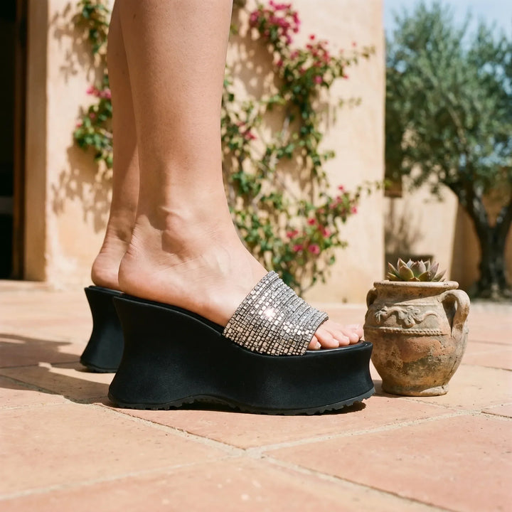 Women's chunky platform sandals with high heels, perfect for elevated summer style and fashion statements.