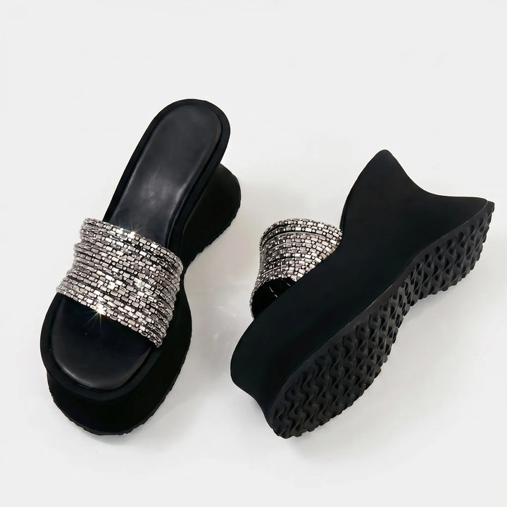 Slip-on platform sandals for women, featuring a chunky sole and open toe design, ideal for evening wear.
