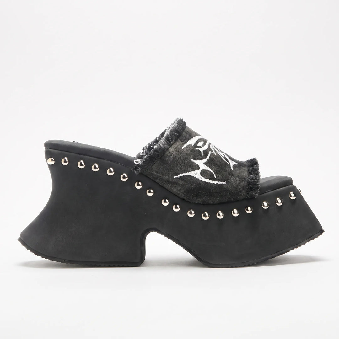 Women's fashionable chunky platform sandals. Comfortable slip-on mule design with a modern block heel.