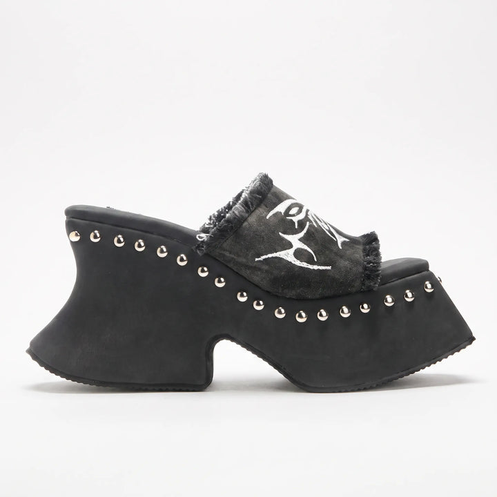 Women's fashionable chunky platform sandals. Comfortable slip-on mule design with a modern block heel.
