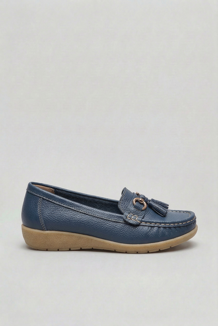 Woman wearing comfortable slip-on loafers for women, paired with casual everyday attire.