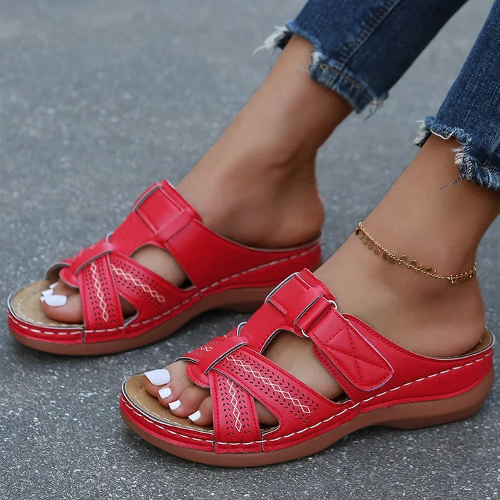 Adjustable strap on women's comfort sandals, providing custom fit & arch support for walking.