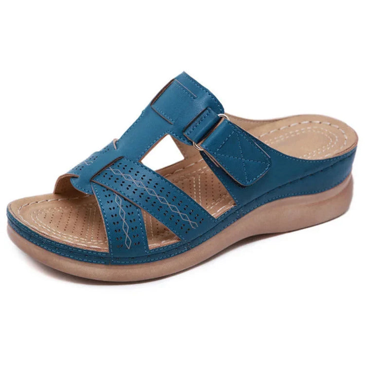 Side view of women's comfort sandals, highlighting arch support & durable design for stability.