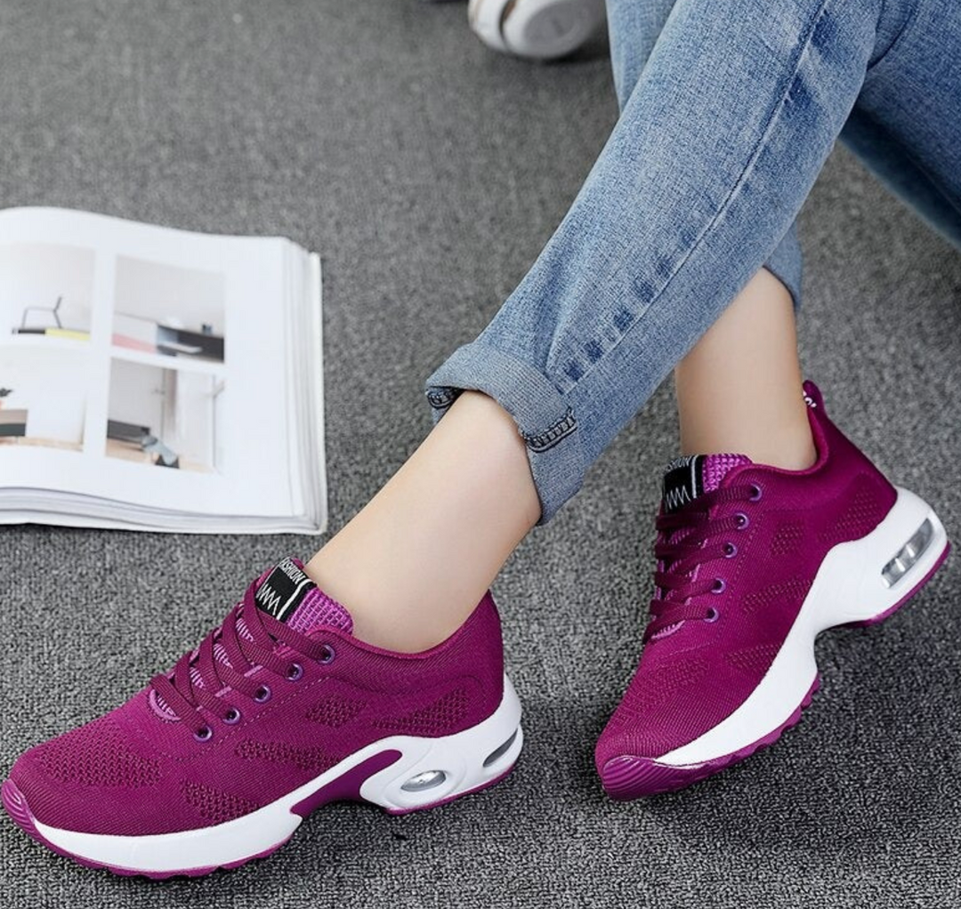Comfortable women's footwear: air-cushioned athletic shoes ensuring lightweight support for women.