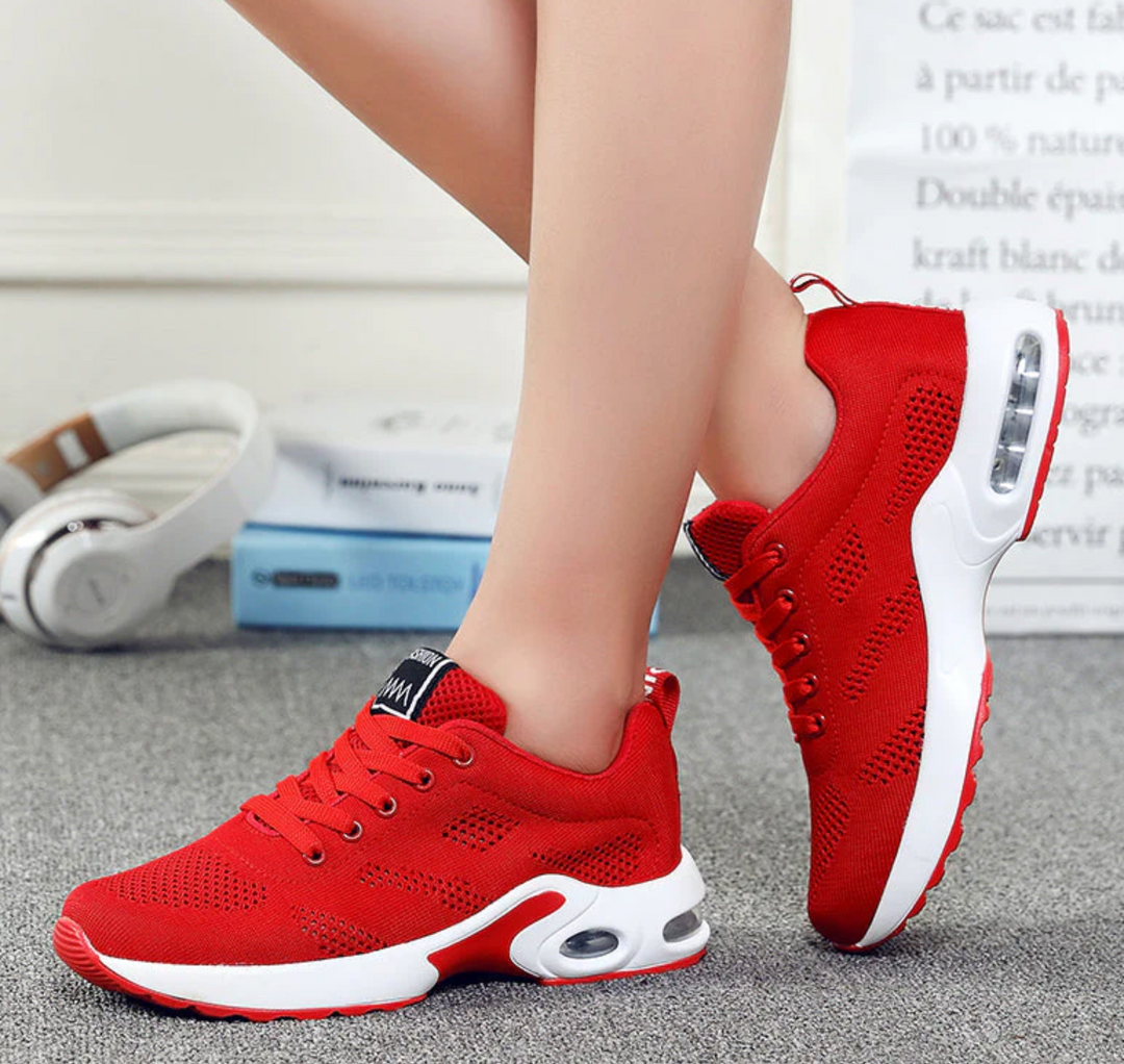 Breathable women's athletic sneakers, designed for superior comfort with responsive air cushioning.