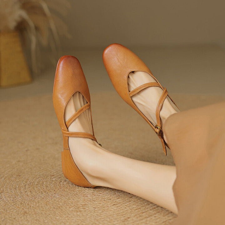 Stylish women's casual flats with adjustable strap. Versatile closed-toe footwear for everyday style.