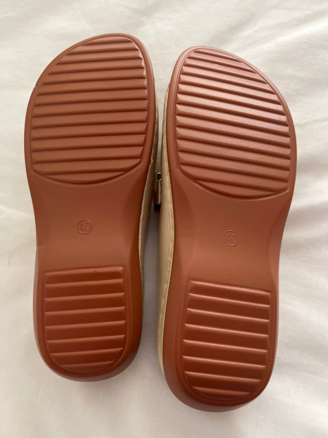 Summer-ready women's comfortable mules with a fashionable open-toe and buckle strap detail.