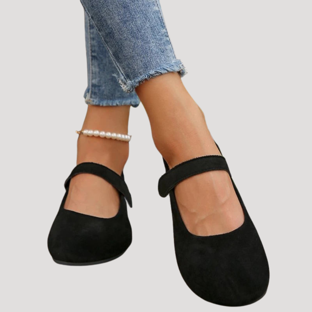 Classic women's velcro Mary Jane flats, slip-on design, round toe, and cushioned for comfortable casual walking.