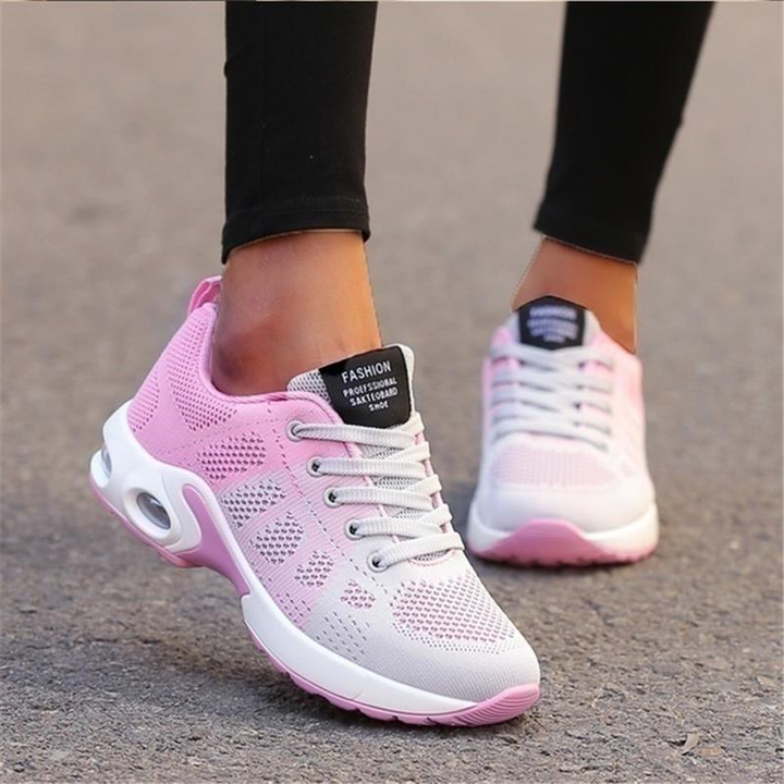 Women's active lifestyle shoes with flexible sole and orthopedic arch support for walking comfort.