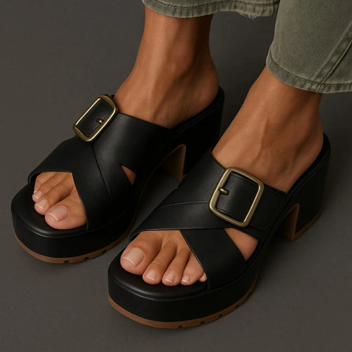Crisscross strap women's orthopedic sandals with a supportive cushioned sole & adjustable buckle for comfort.