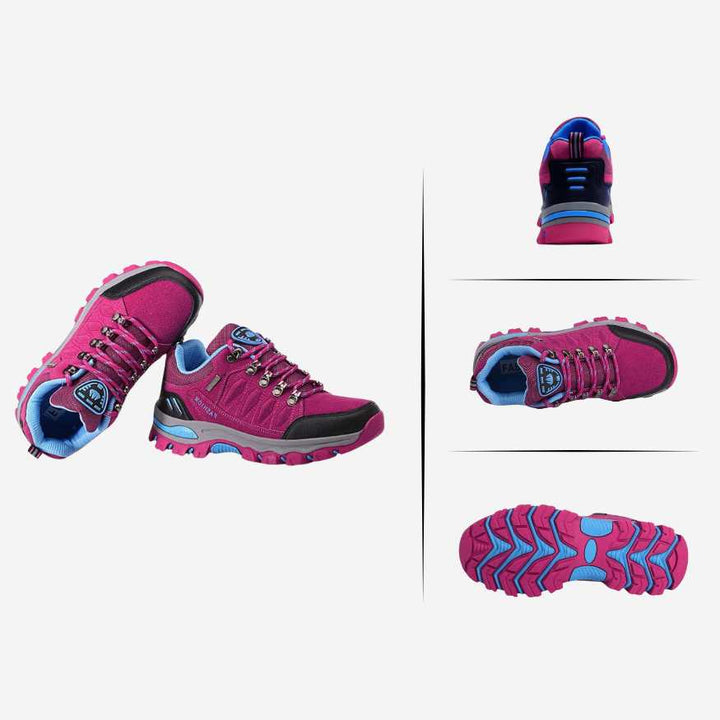 Stylish women's hiking shoes in pink and gray, offering comfort and support on rugged trails