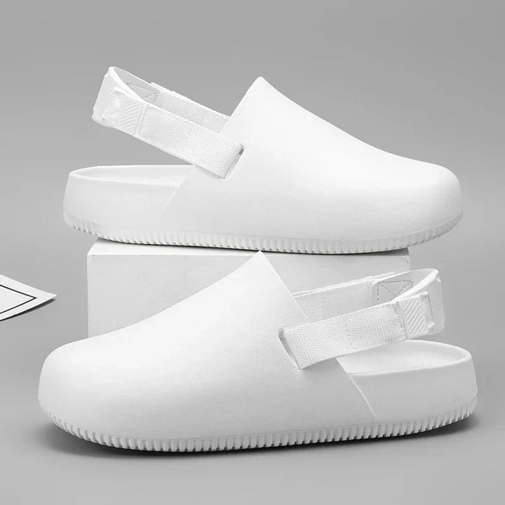 Stylish women's casual clogs with easy slip-on design & adjustable strap for all-day comfortable everyday wear.