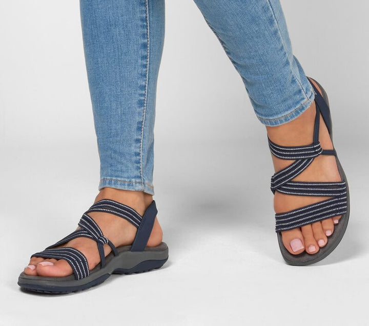 Stylish women's slip-on sandals, perfect for casual summer fashion. Lightweight and easy-wear everyday footwear.