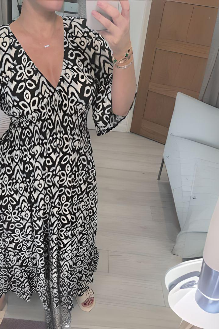 Elegant women's wrap maxi dress featuring an adjustable waist tie, ideal for summer fashion and a chic look.