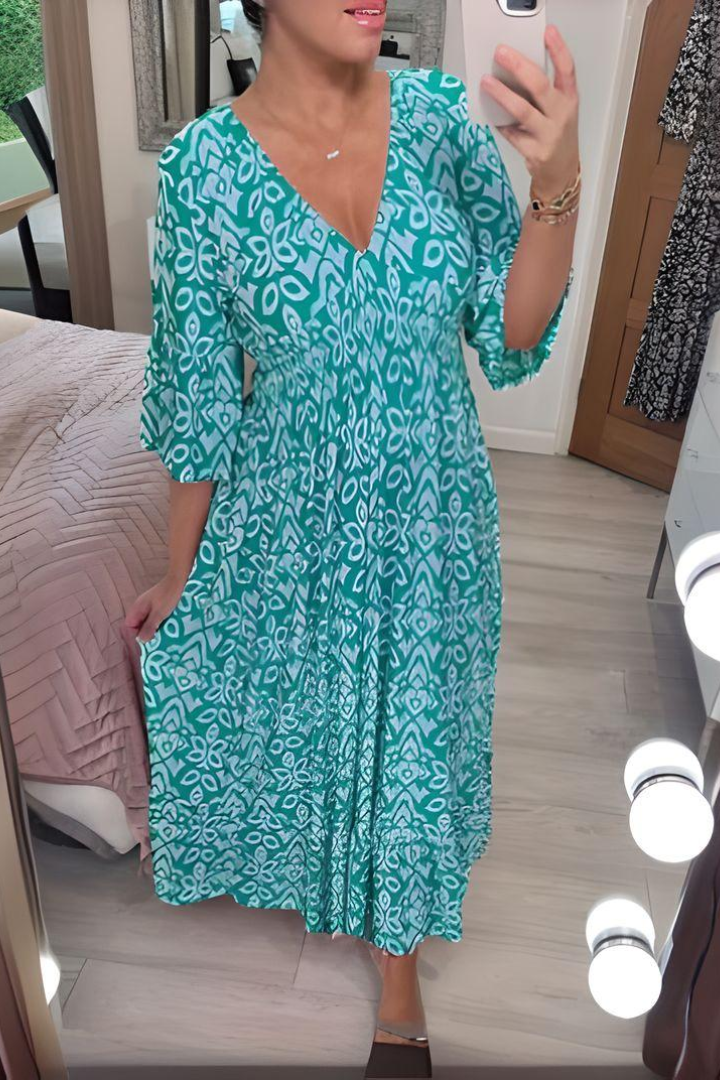 Chic women's wrap maxi dress, comfortable and elegant with an adjustable waist tie for a versatile summer look.