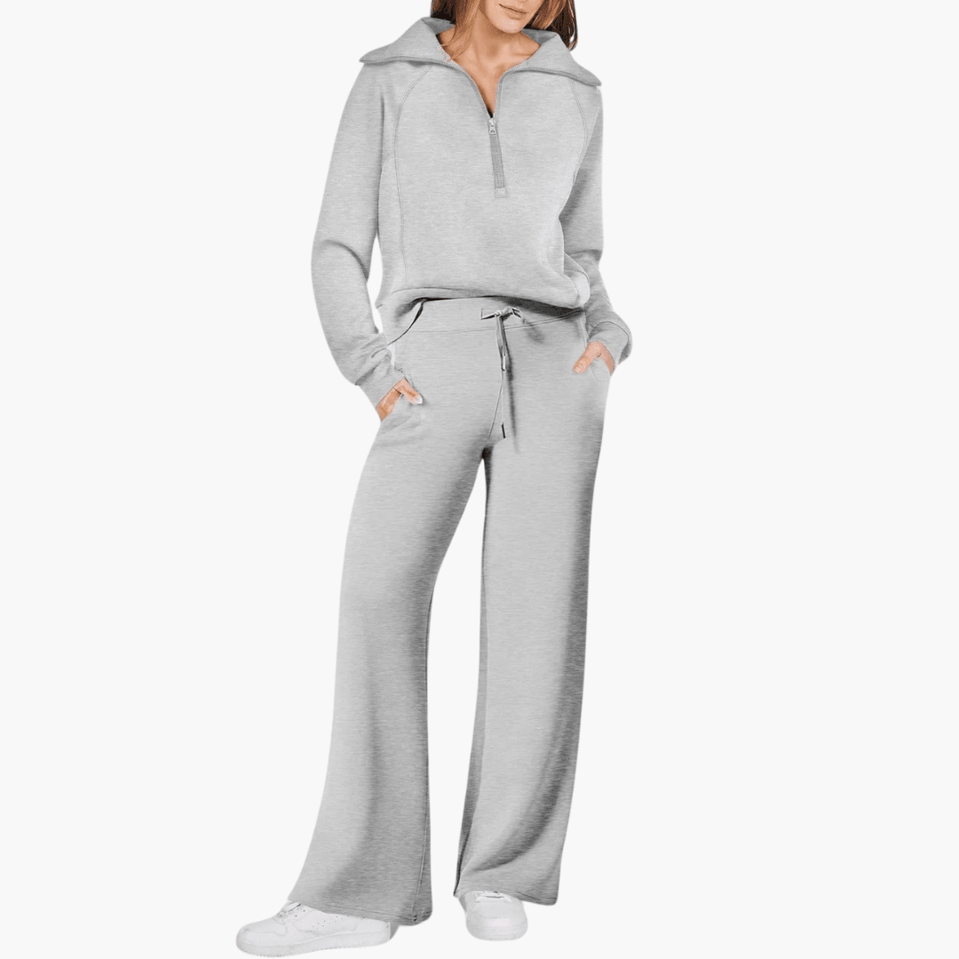 Stylish women's zip up hoodie and wide leg pants set. Versatile two-piece athleisure outfit for ultimate comfort.